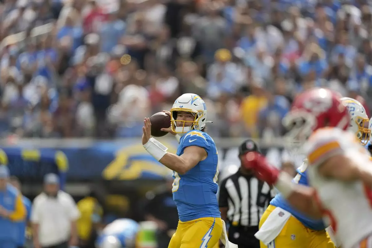 Los Angeles Chargers quarterback Justin Herbert throws during the first half of an NFL football game against the Kansas City Chiefs Sunday, Sept. 29, 2024, in Inglewood, Calif. (AP Photo/Ashley Landis)