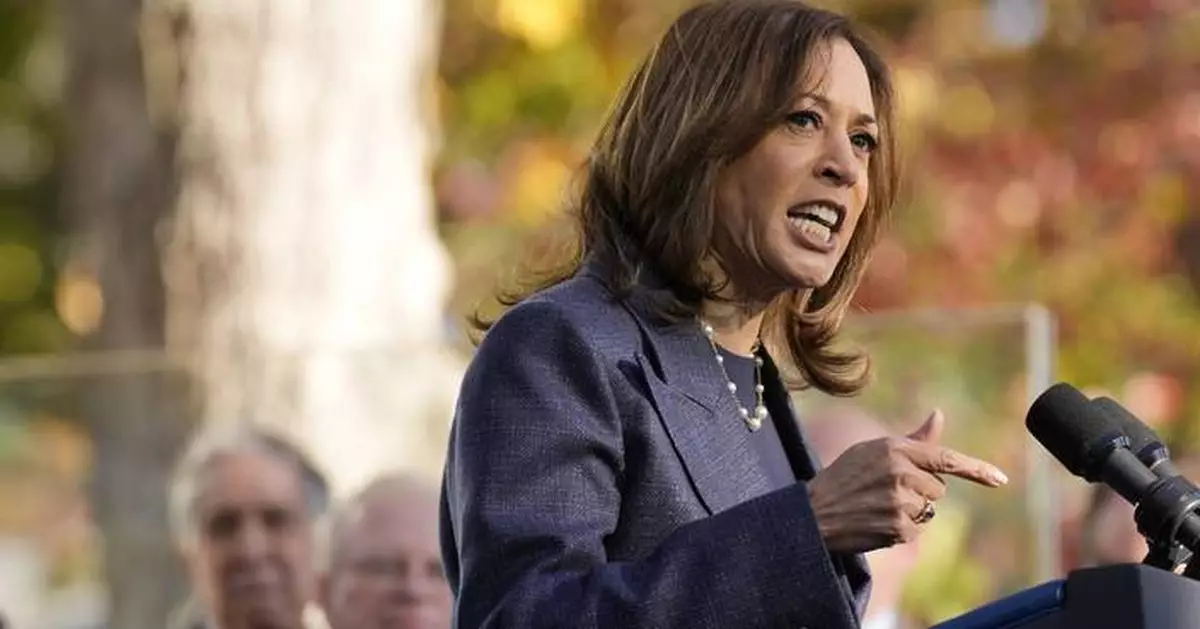 The Latest: Harris keeps a focus on 'blue wall' states in the campaign's final weeks