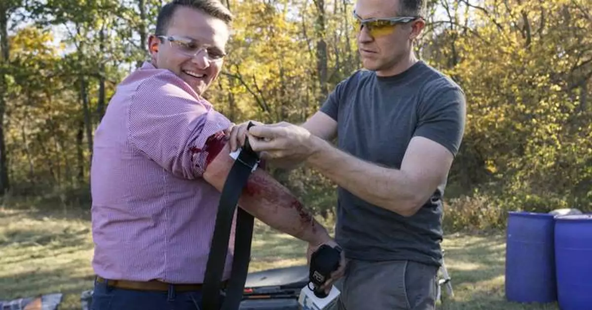 Flyaway metal from Missouri Democratic Senate candidate's rifle grazes reporter at campaign event