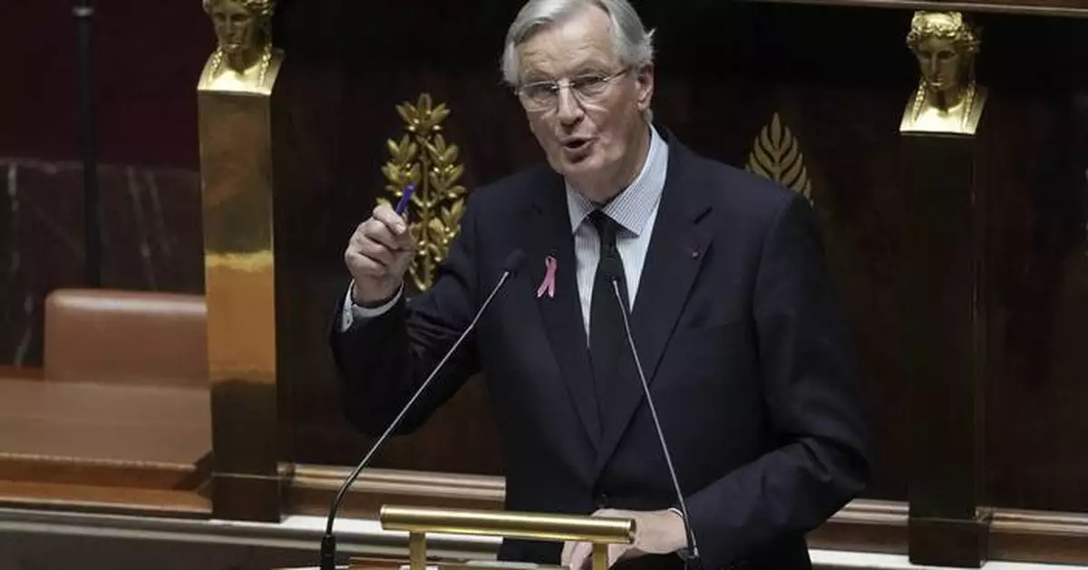 France's prime minister vows to curb debt as he faced baptism of fire at heckled parliament