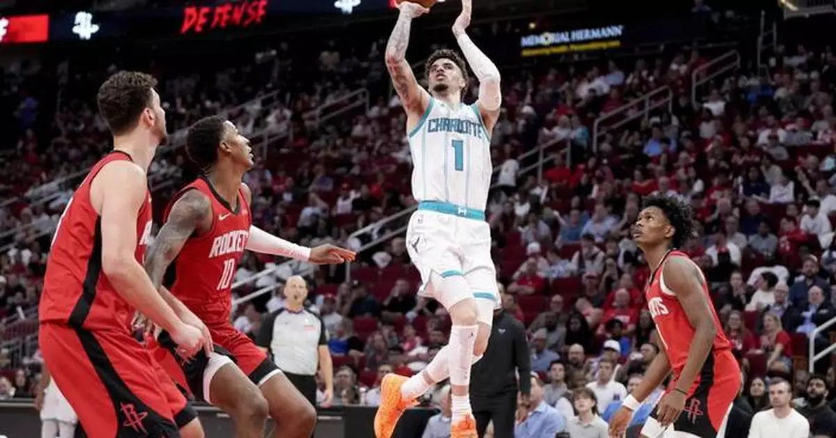 Ball has 34 points and 11 assists in return from ankle injury to lead Hornets over Rockets 110-105