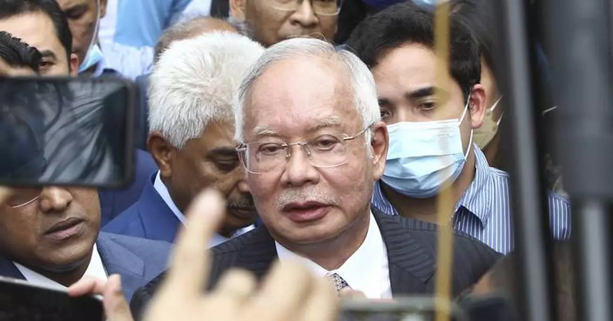 Jailed former Malaysian leader apologizes for fund embezzlement scandal, reiterates his innocence