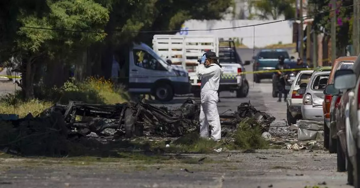 A car bomb explodes outside a police station in western Mexico, wounding 3 officers