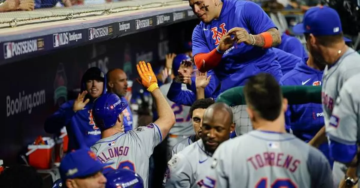 Mets use another October rally to score 5 runs in 8th and top Phillies 6-2 in Game 1 of NLDS