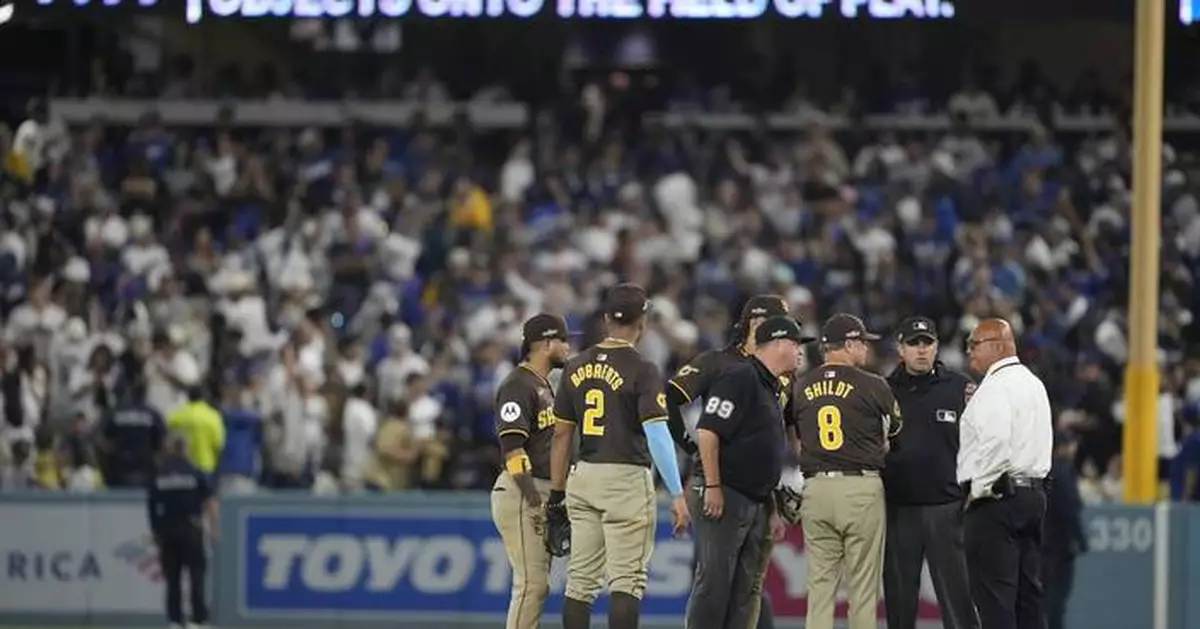 Dodger Stadium fans toss balls and trash on field, interrupt Padres' 10-2 win that evens NLDS