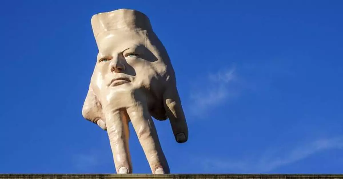 A New Zealand city waves goodbye to its 'disturbing' giant hand sculpture that many came to love