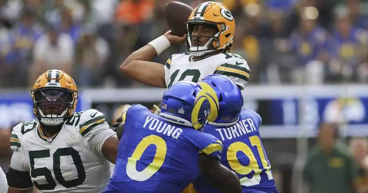 Jordan Love throws a pair of TD passes in the second half to rally Packers past Rams 24-19