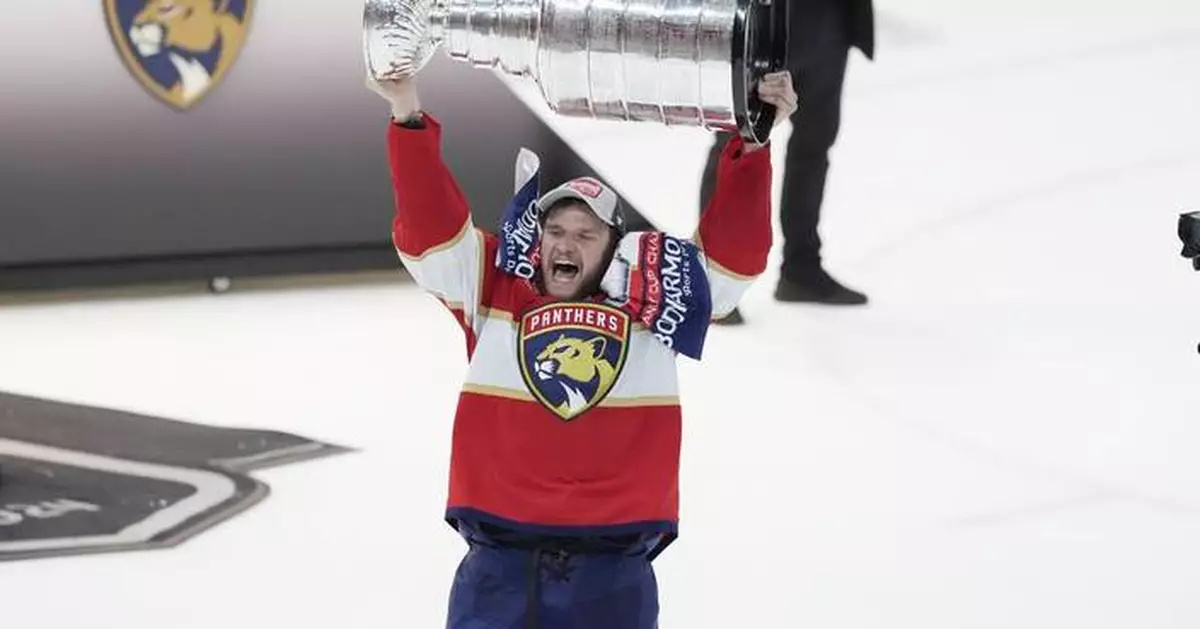 Panthers lift their championship banner, capping their Stanley Cup celebrations