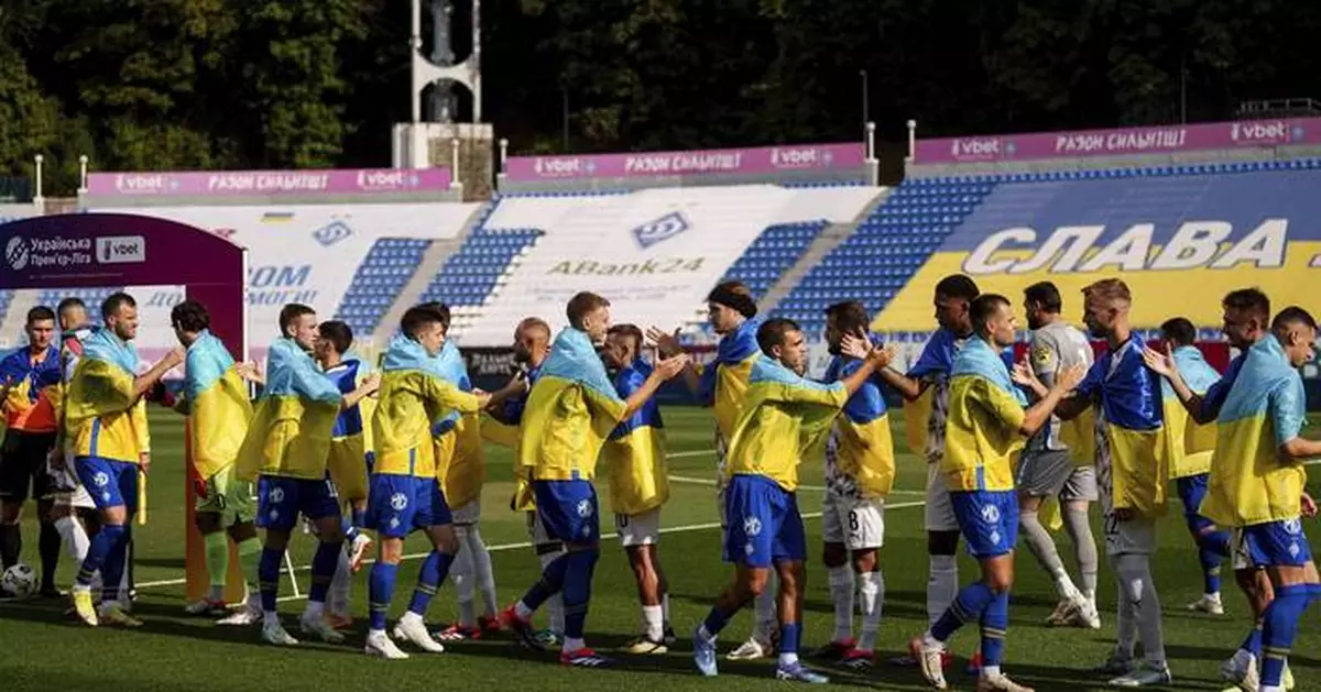 In wartime Ukraine, soccer fans bury rivalries and find a moment of calm at matches