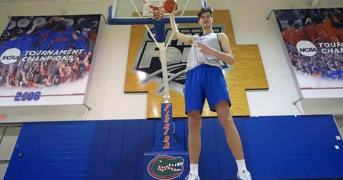 At 7 feet, 9 inches, Olivier Rioux is the world's tallest teen and an intriguing basketball project