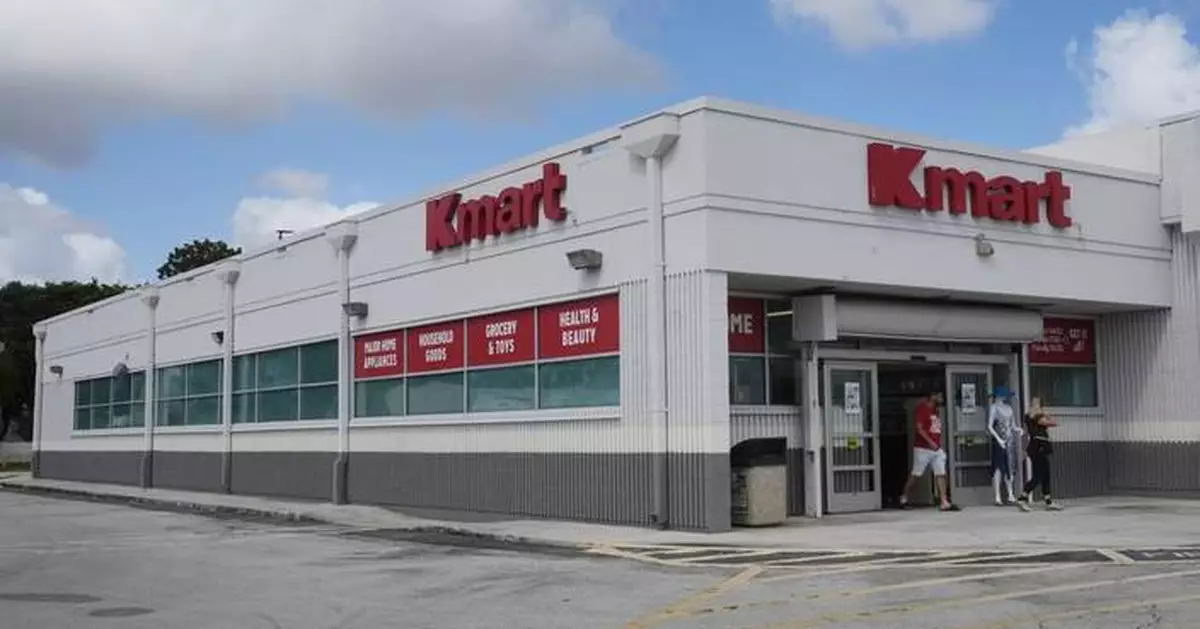 In a suburban Miami shopping center, Kmart's last 'Blue Light Specials' flicker