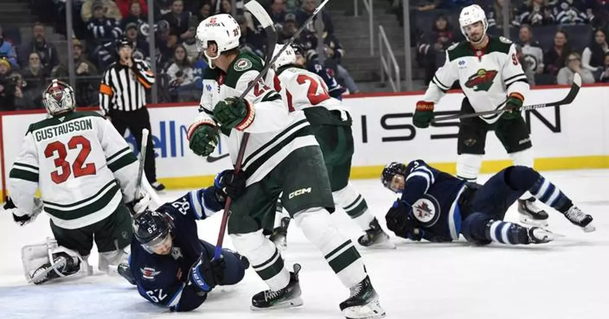 Power-play goal in OT gives Jets win over Wild