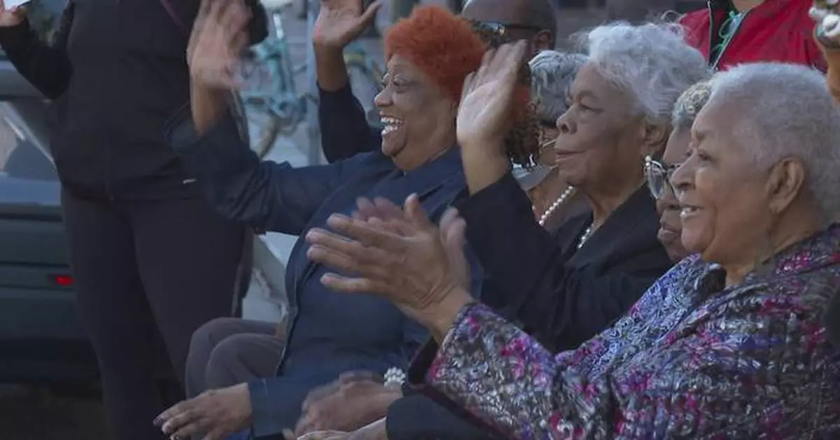 New Orleans marks with parade the 64th anniversary of 4 little girls integrating city schools