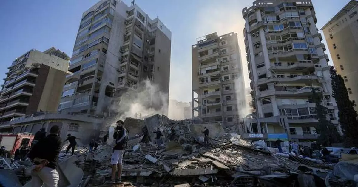 Middle East latest: Workers search through rubble in eastern Lebanon where Israeli strike killed 13