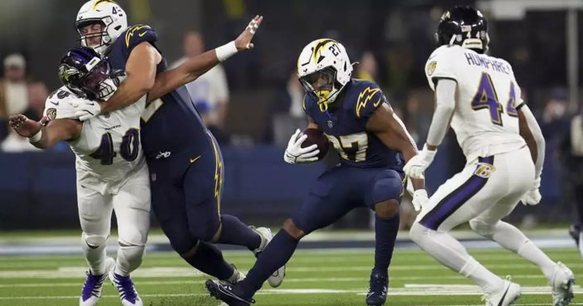 Chargers struggle to score after RB J.K. Dobbins hurts his knee in his reunion game with Ravens