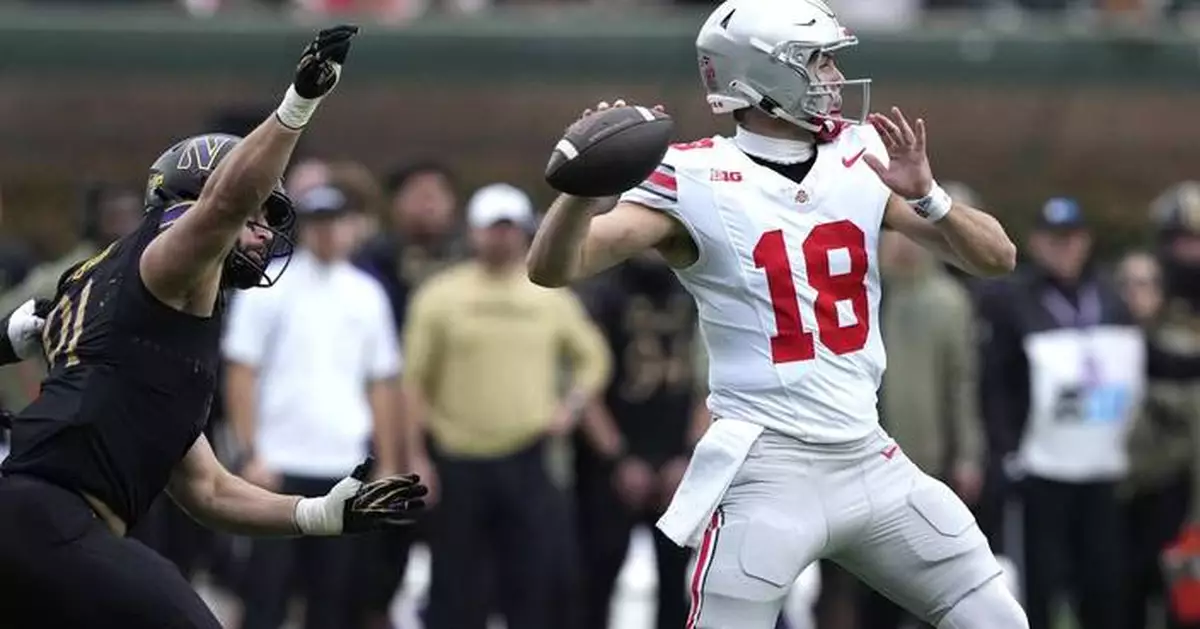 Will Howard helps No. 2 Ohio State rout Northwestern 31-7 at Wrigley Field