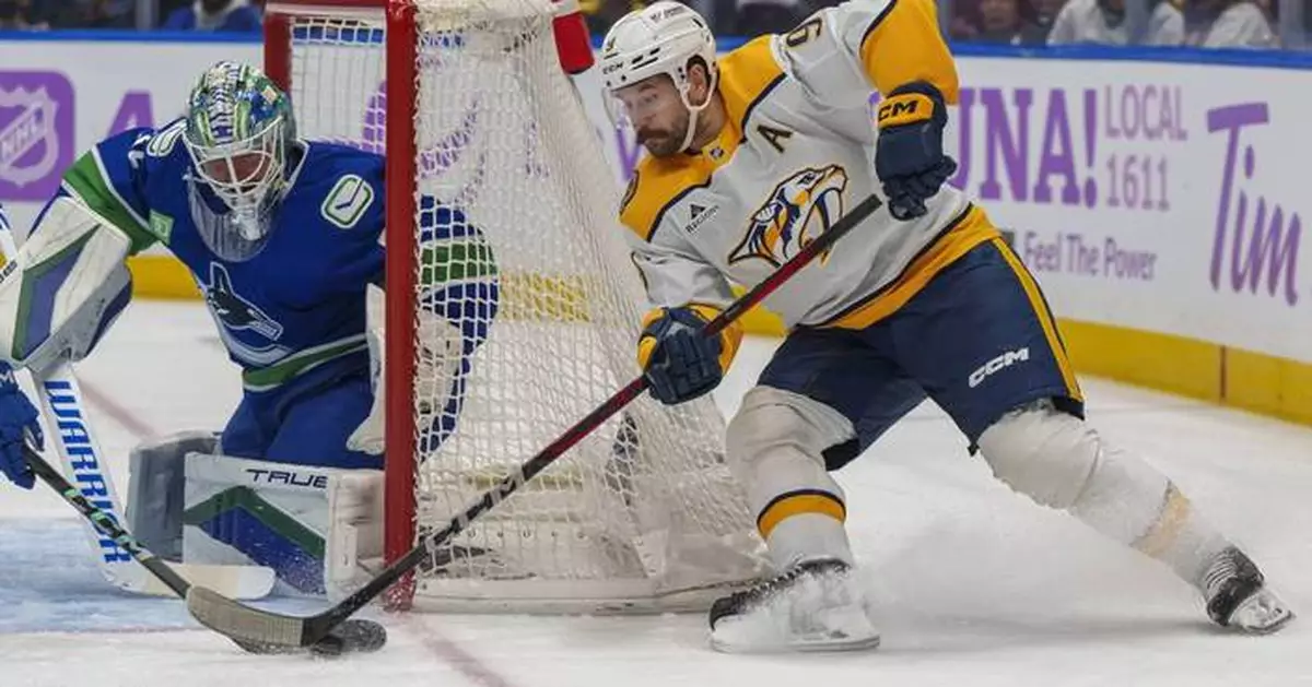 Steven Stamkos scores twice on power play in the Predators' 5-3 victory over the Canucks