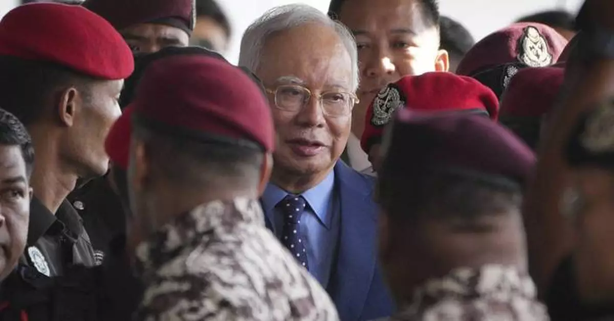 Malaysian court drops one of the graft cases against jailed former premier Najib Razak