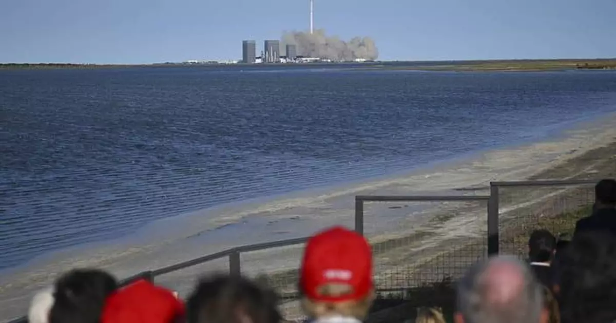 SpaceX launches giant Starship rocket, but aborts attempt to catch booster with mechanical arms