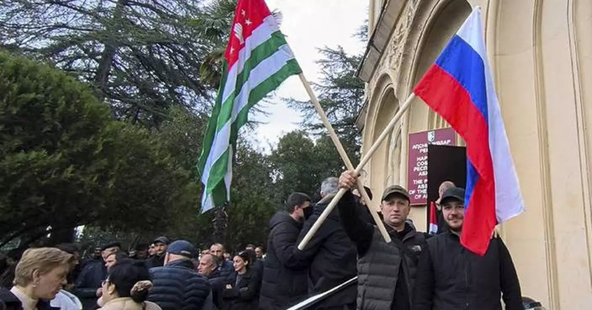 Protesters in separatist Georgian region occupy government buildings, calling for leader's ouster