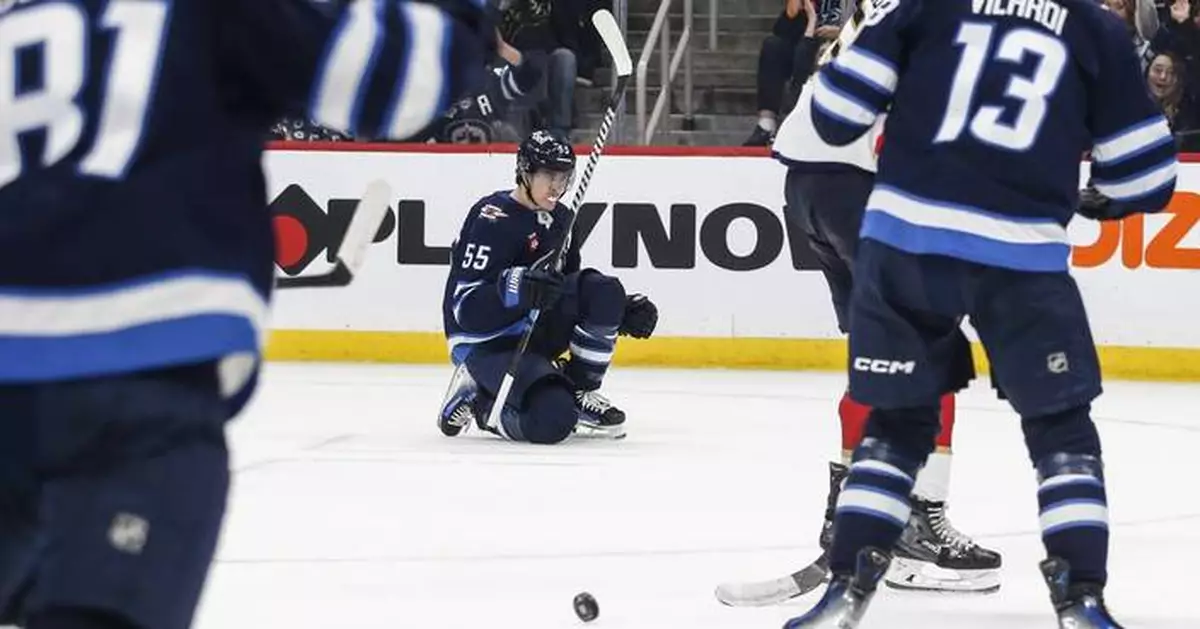 Mark Scheifele scores a hat trick and league-leading Jets beat Panthers 6-3