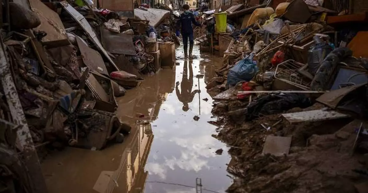 A week after Spain's floods, families hold out hope that missing loved ones are alive