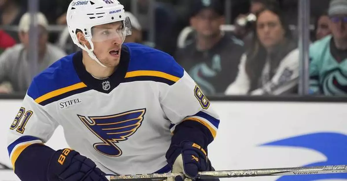 Blues' Dylan Holloway escapes serious injury after being struck in neck by puck