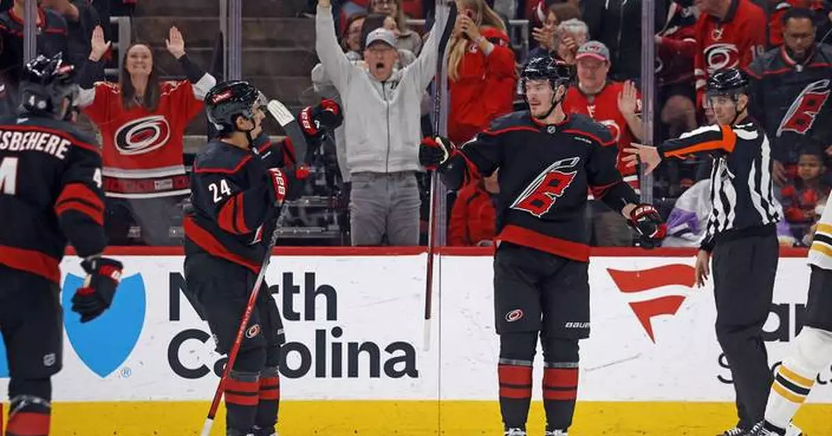 Roslovic, Svechnikov each score twice to help the Hurricanes rout the Bruins 8-2