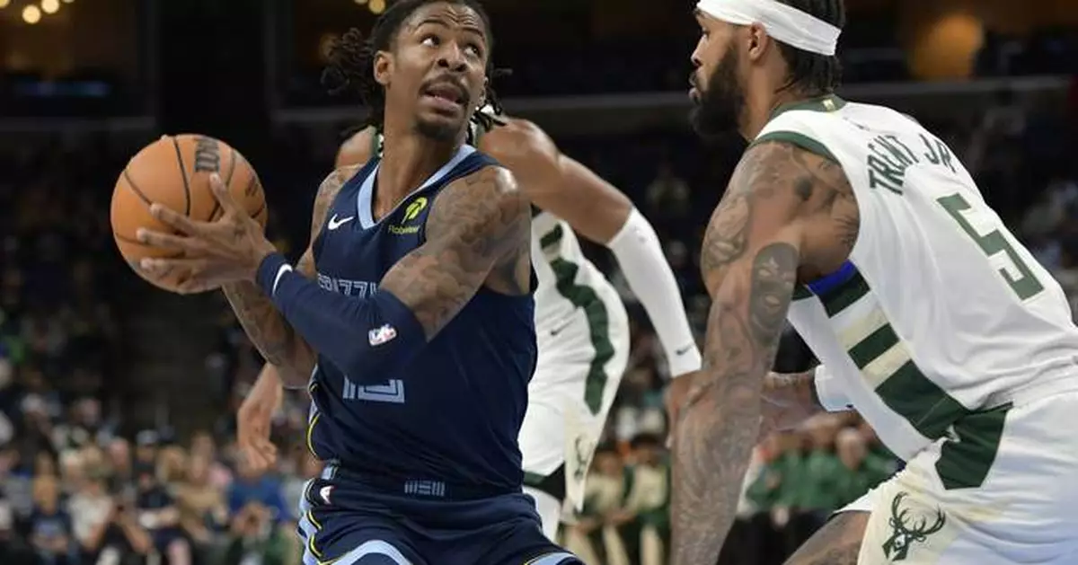 Morant's triple-double helps Grizzlies build big lead and coast to 122-99 victory over Bucks