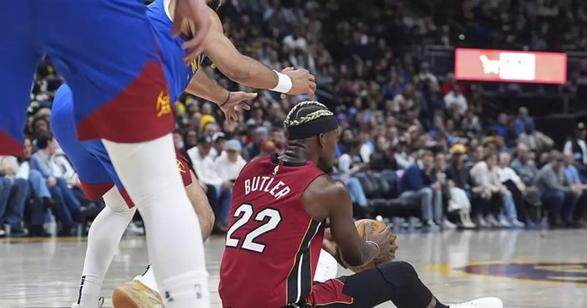 Heat hold Jimmy Butler out of game at Minnesota with sprained ankle