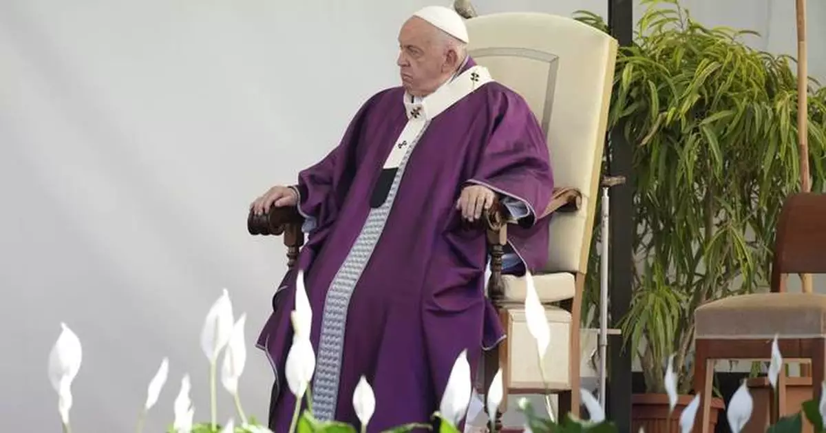 Pope Francis prays in front of graves of unborn children ahead of All Souls' Day Mass