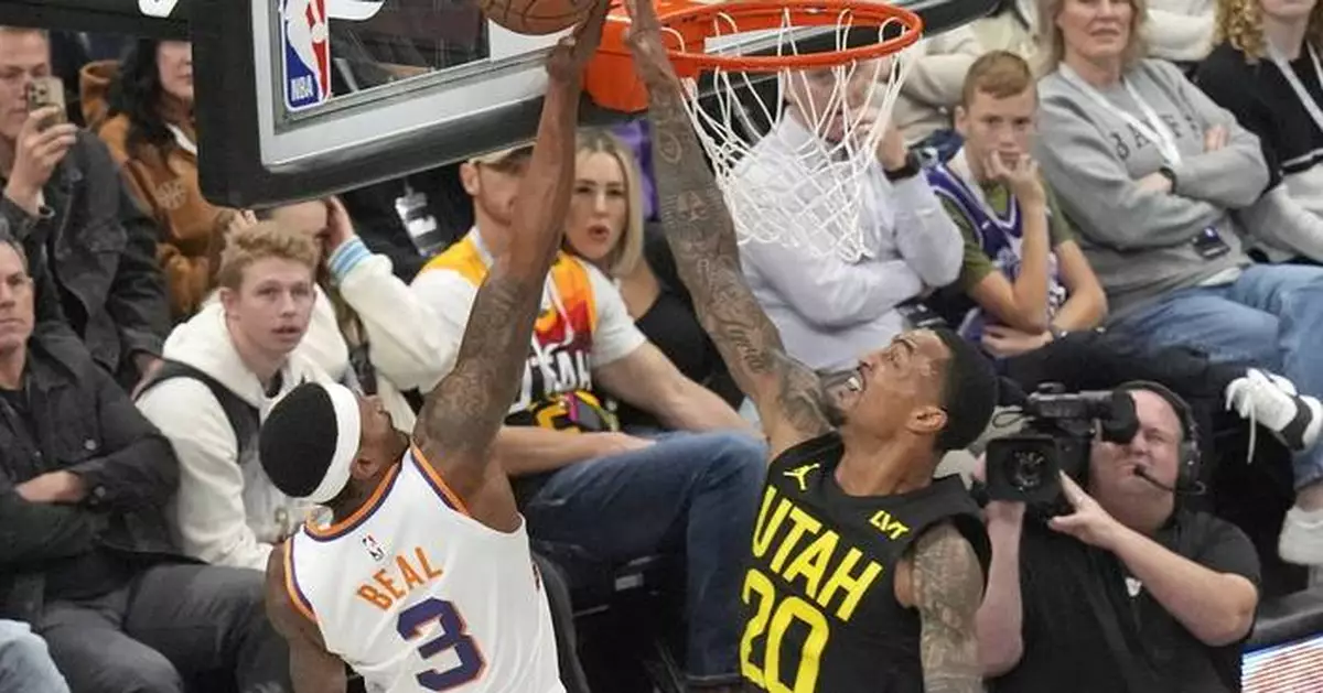 Booker scores 31, leads Suns to 120-112 victory over Jazz in the teams' NBA Cup opener