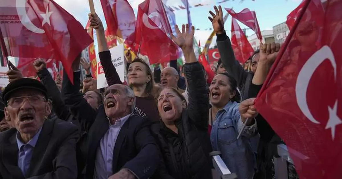 Hundreds in Turkey protest the arrest and ouster of opposition mayor