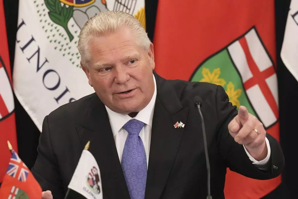 FILE - Ontario Premier Doug Ford attends a signing of a memorandum of understanding with Governor of Illinois J.B. Pritzker, at the US-Canada Summit in Toronto, Canada, June 11, 2024. (Chris Young /The Canadian Press via AP, File)