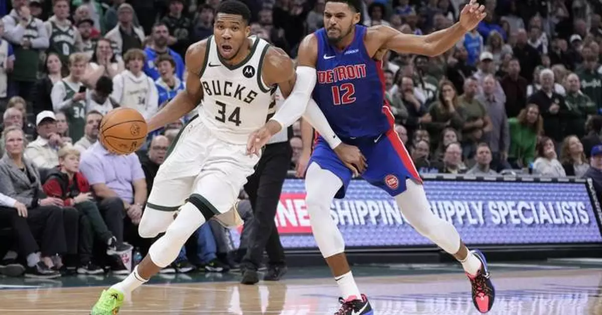 Antetokounmpo scores 59 and Bucks beat Pistons 127-120 in overtime