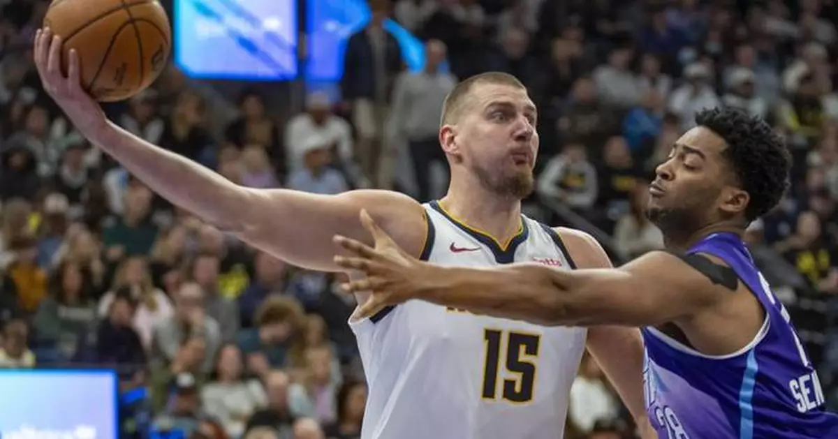 Jokic leads the Nuggets to a 122-103 win over the Jazz