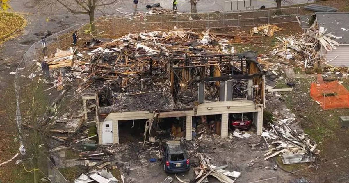 Explosion rocks condominium in Detroit suburb, sparking fires and injuring 2