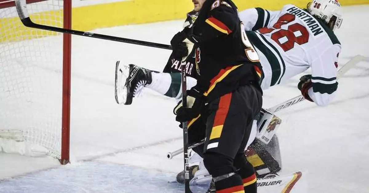 Andersson scores shootout winner, and the Flames hold off a late Wild comeback in 4-3 win