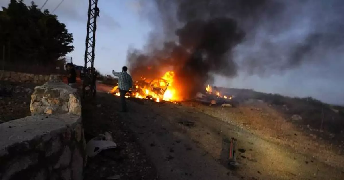 AP PHOTOS: A look at more than a year of fighting as Israel and Hezbollah begin ceasefire