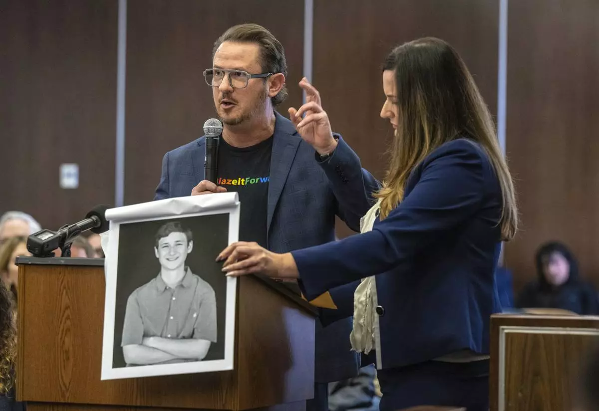 Gideon Bernstein, father of Blaze Bernstein, left, speaks as he gives a victim impact statement in court in Santa Ana, Calif., Friday, Nov. 15, 2024, prior to sentencing of Samuel Woodward, who was convicted of a hate crime murder for the killing of former classmate Blaze Bernstein. Senior Deputy District Attorney Jennifer Walker stands at right. (Mark Rightmire/The Orange County Register via AP, Pool)