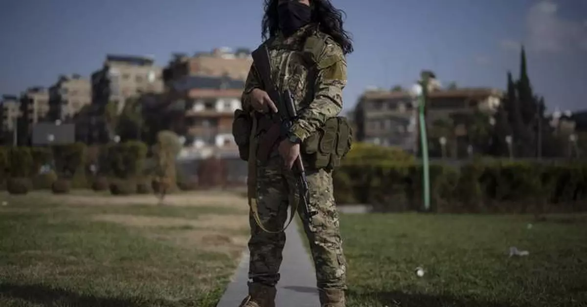 AP PHOTOS: Portraits of former Syrian rebels now soldiers