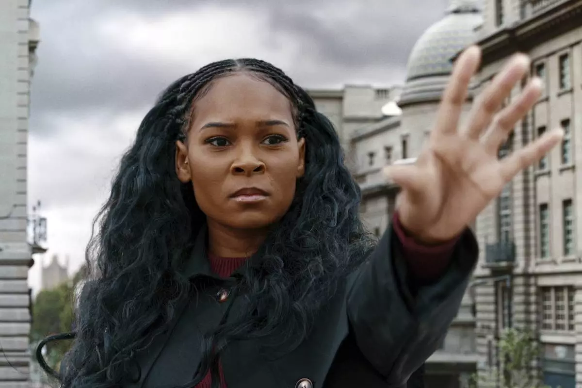 This image released by Netflix shows Nadine Mills in a scene from "Supacell." (Netflix via AP)