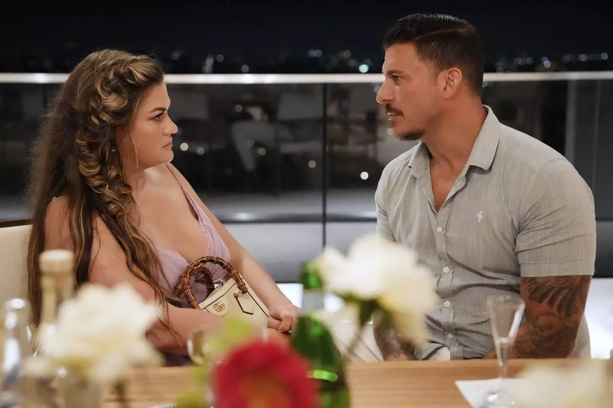 This image released by Bravo shows Brittany Cartwright, left, and Jax Taylor in a scene from the reality series "The Valley." (Casey Durkin/Bravo via AP)
