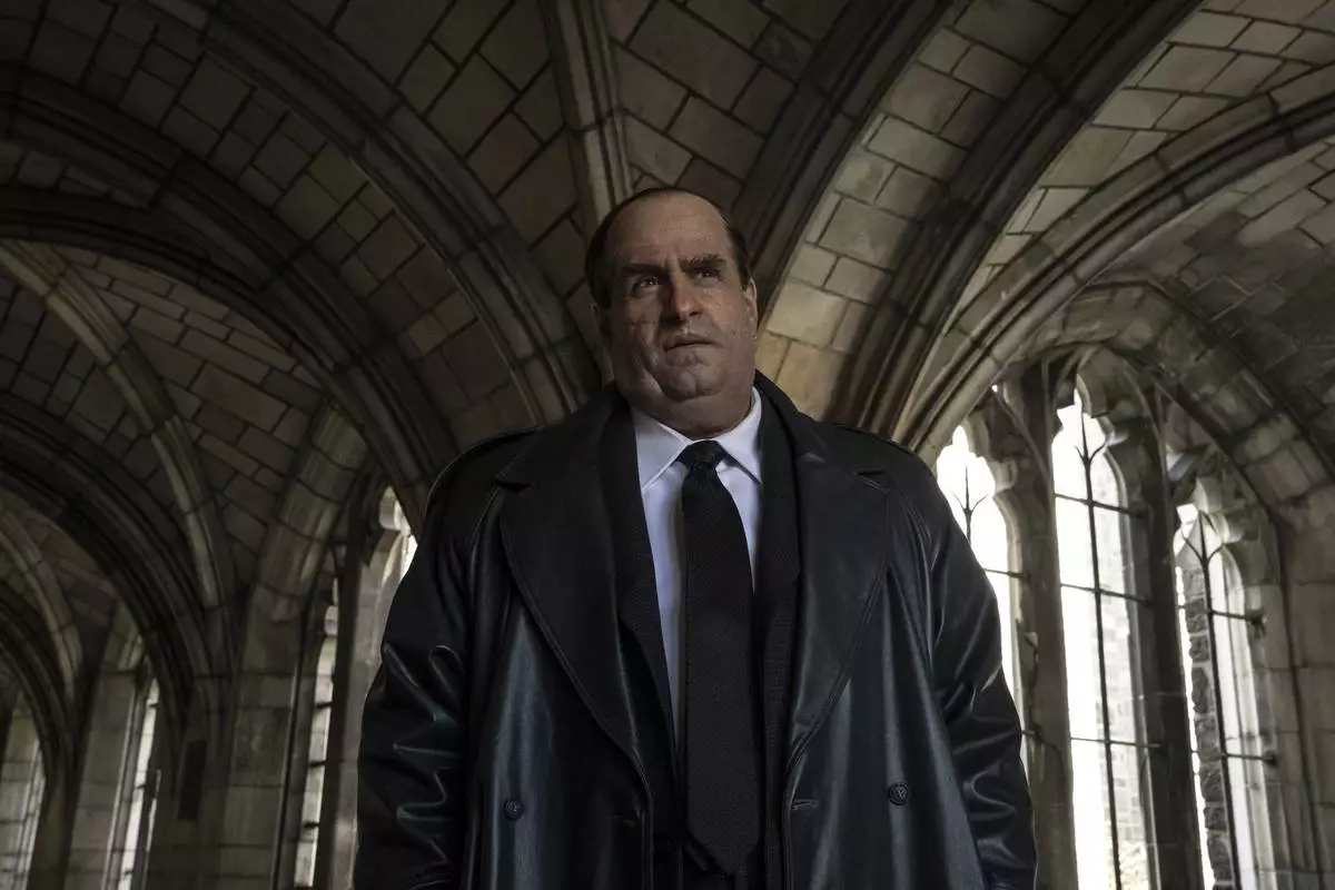 This image released by HBO shows Colin Farrell in a scene from the series "Penguin." (HBO via AP)