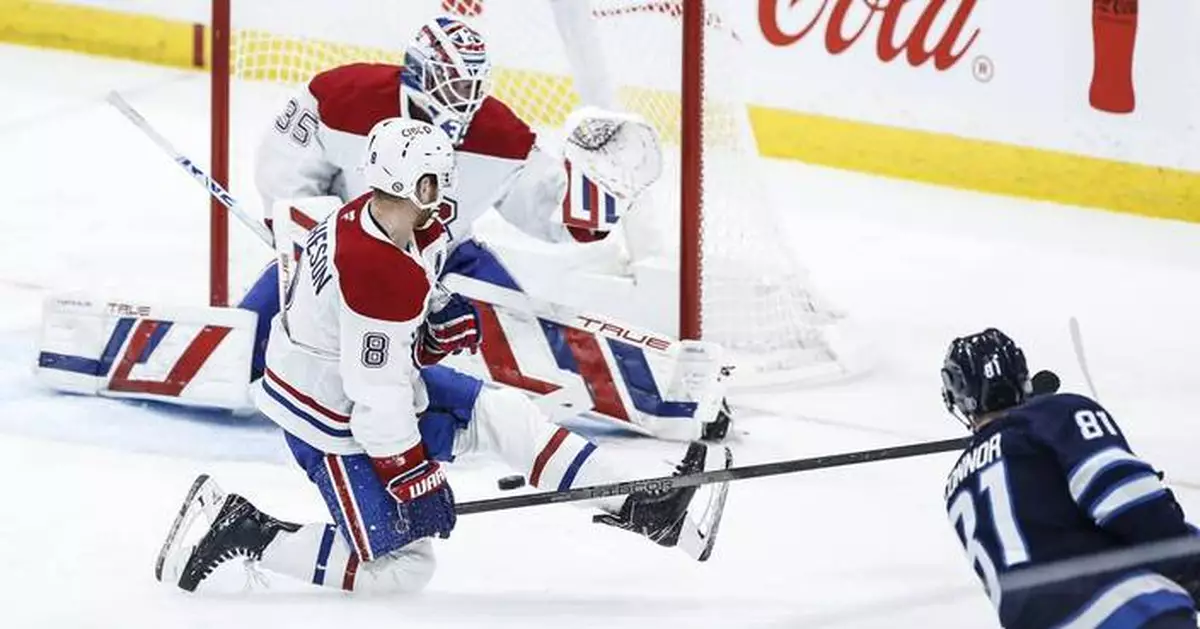 Connor Hellebuyck makes 26 saves in the Jets' 4-2 victory over the Canadiens