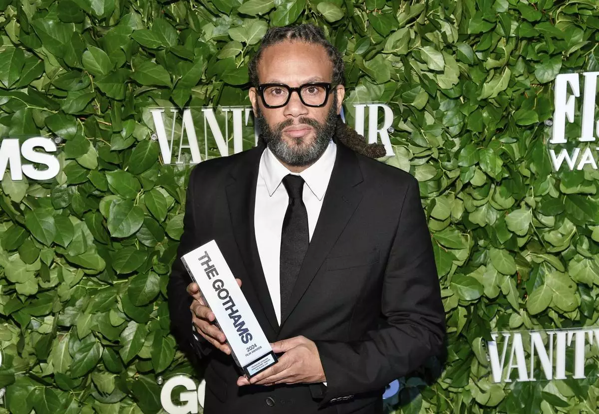 Franklin Leonard poses with the anniversary tribute award during The Gothams Film Awards at Cipriani Wall Street on Monday, Dec. 2, 2024, in New York. (Photo by Evan Agostini/Invision/AP)