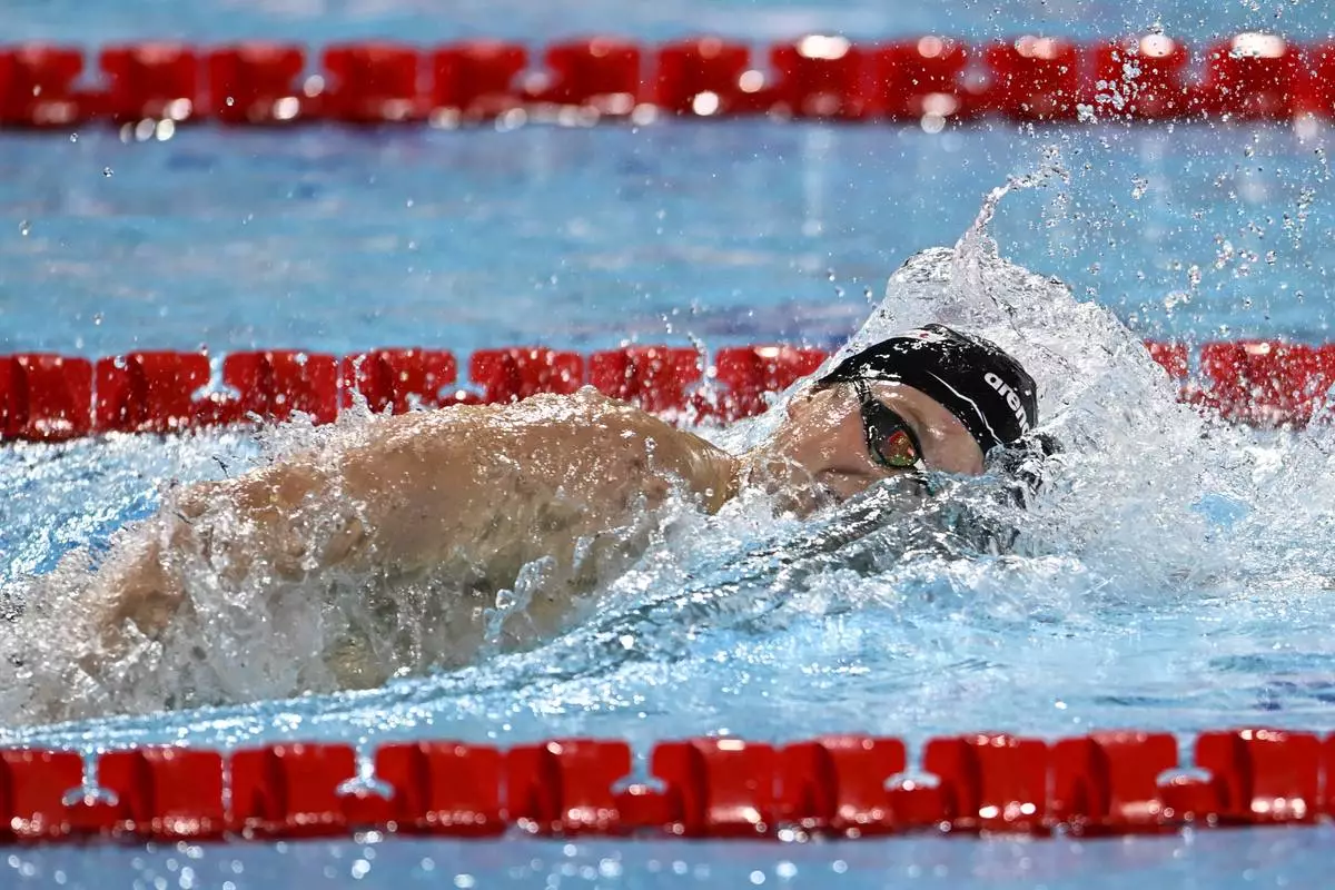 Luke Hobson of the United States swims to win the 200-meter freestyle final at the World Short Course Swimming Championships in Budapest, Hungary, Sunday, Dec. 15, 2024. (AP Photo/Denes Erdos)