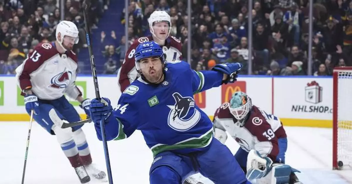 Kiefer Sherwood has 1st NHL hat trick as Canucks beat Avalanche 3-1