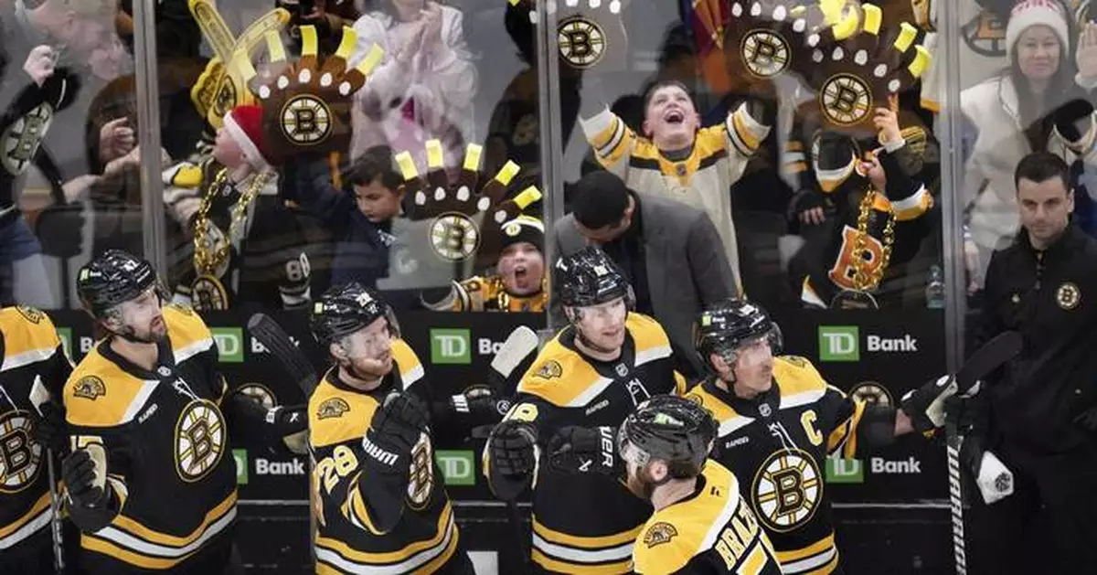 Bruins leading scored David Pastrnak leaves game with upper-body injury