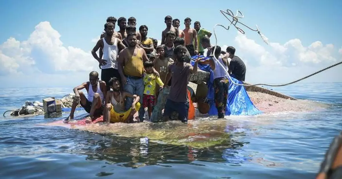 Sri Lanka's navy rescues 102 Rohingya refugees found adrift aboard a fishing trawler